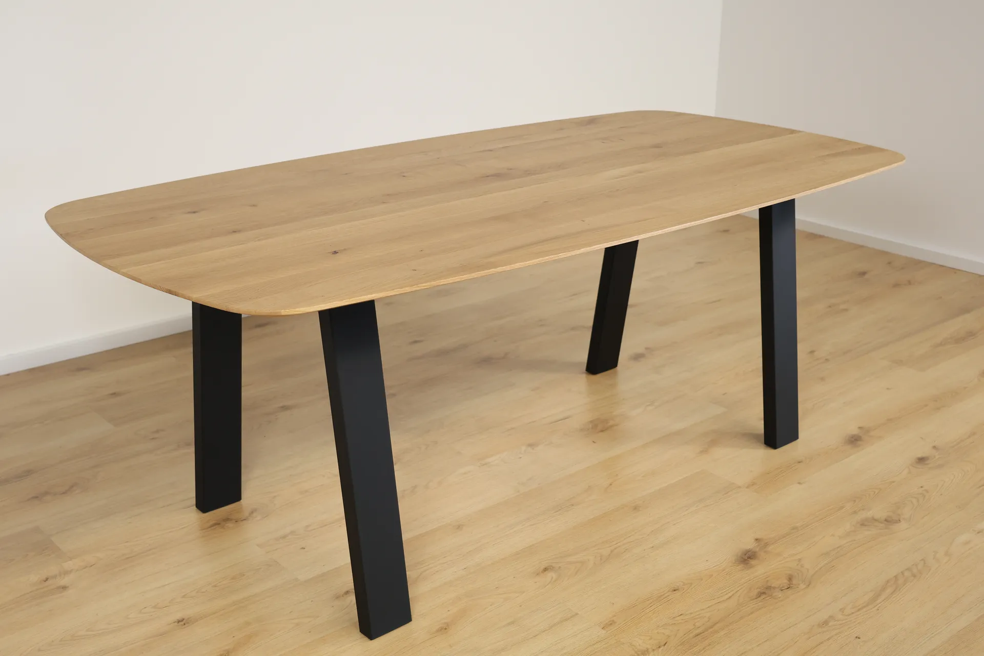 The Eclipse Beveled Oval European Oak Dining Table – product view 9