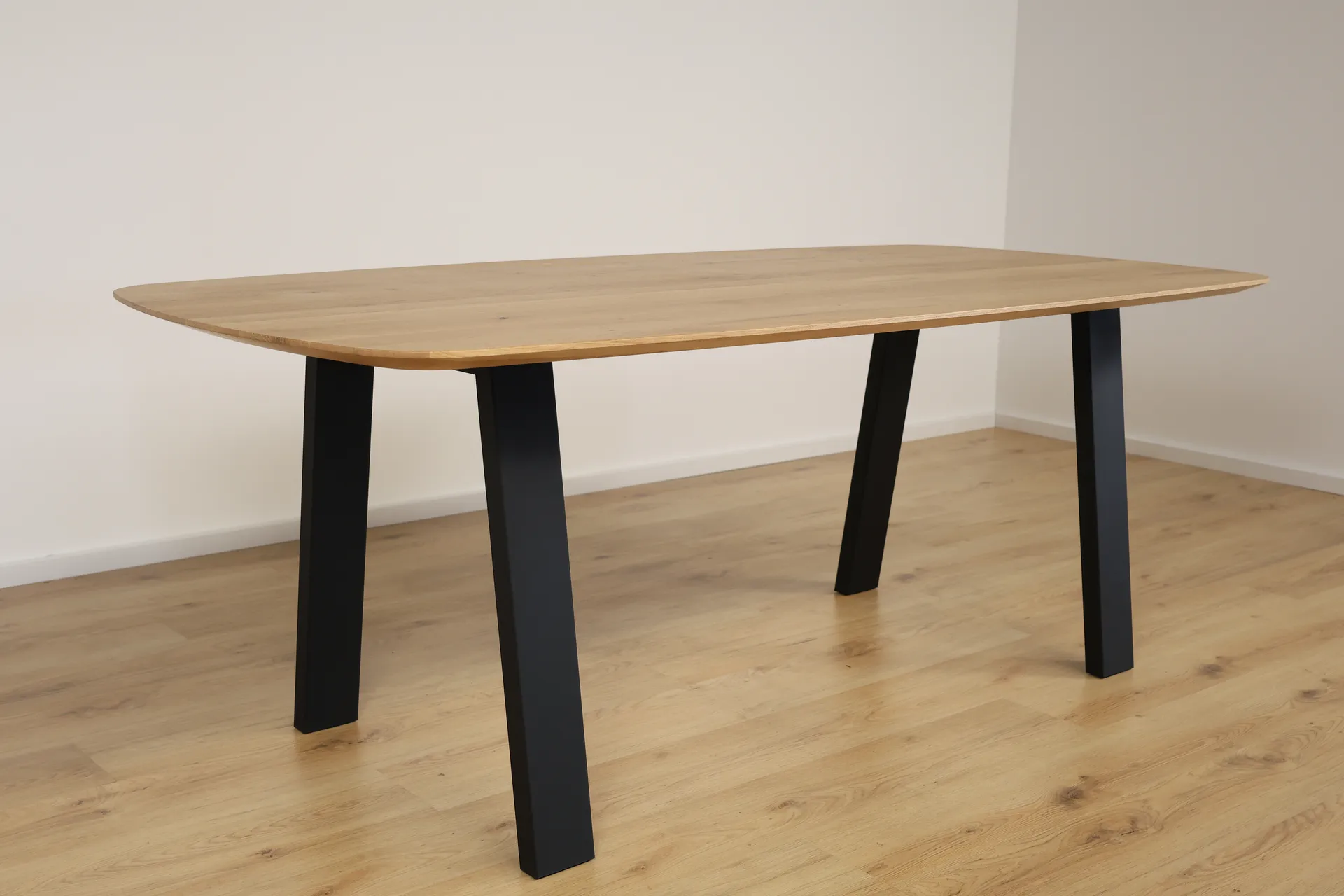 The Eclipse Beveled Oval European Oak Dining Table – product view 10