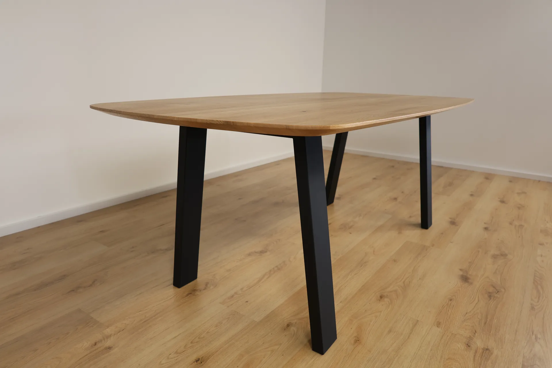 The Eclipse Beveled Oval European Oak Dining Table – product view 11
