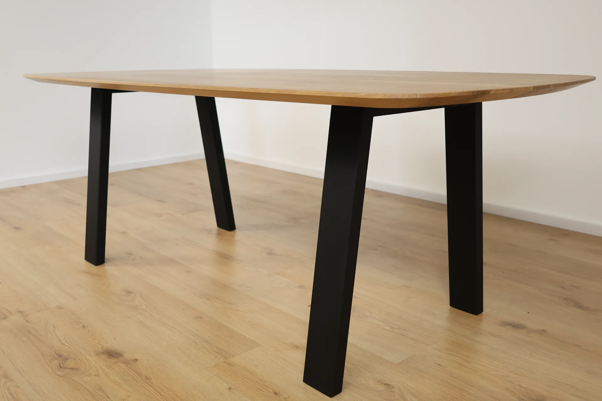 The Eclipse Beveled Oval European Oak Dining Table – product view 3