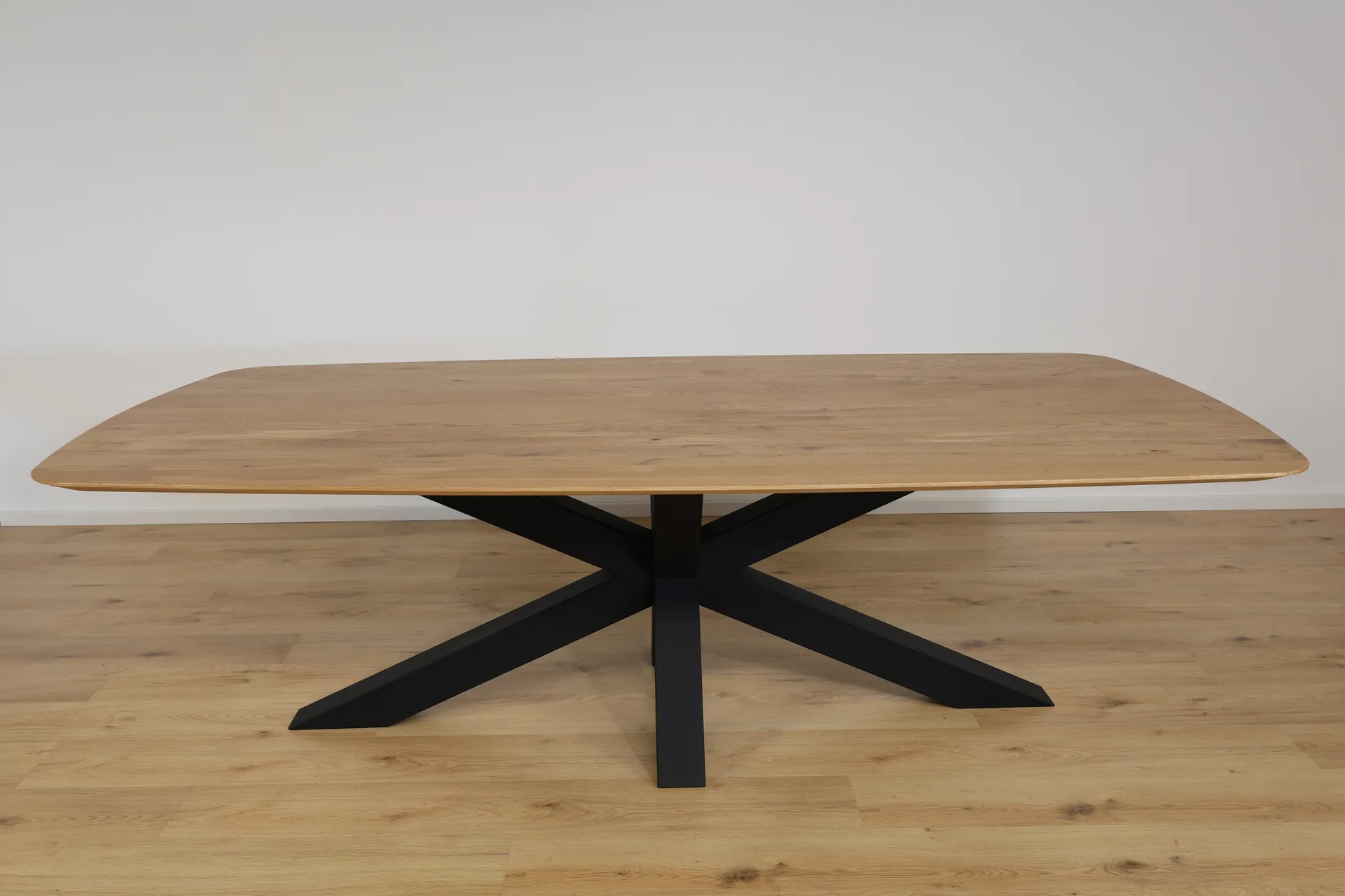 The Solstice Oval European Oak Dining Table with Spider Base
