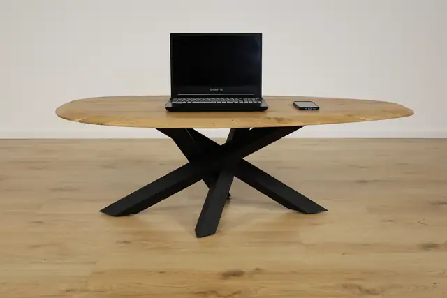 The Solstice Oval Oak Coffee Table with Spider Base